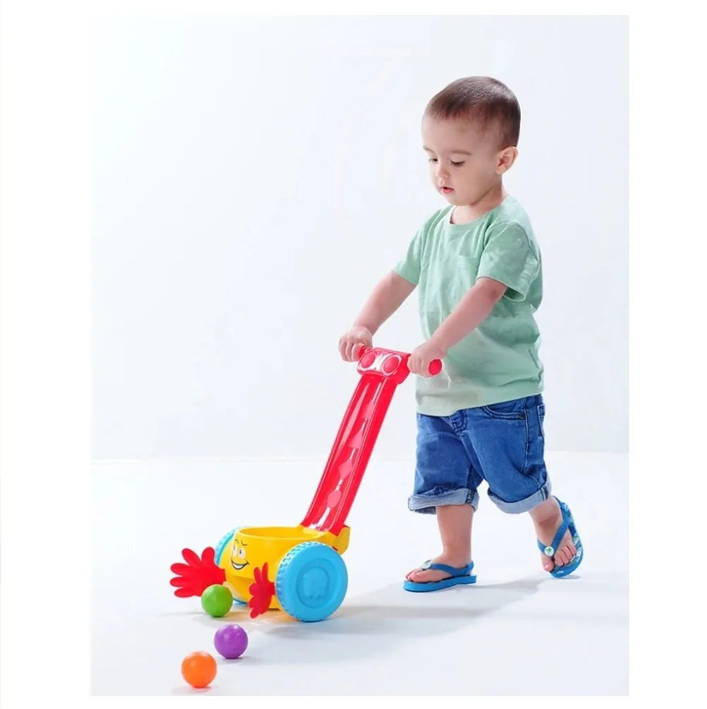 Pushing toy with colored balls