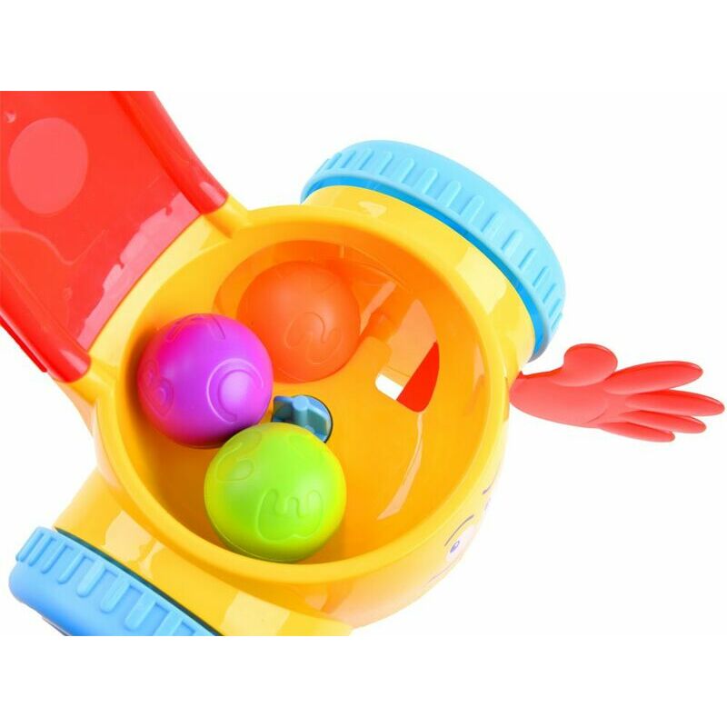 Pushing toy with colored balls